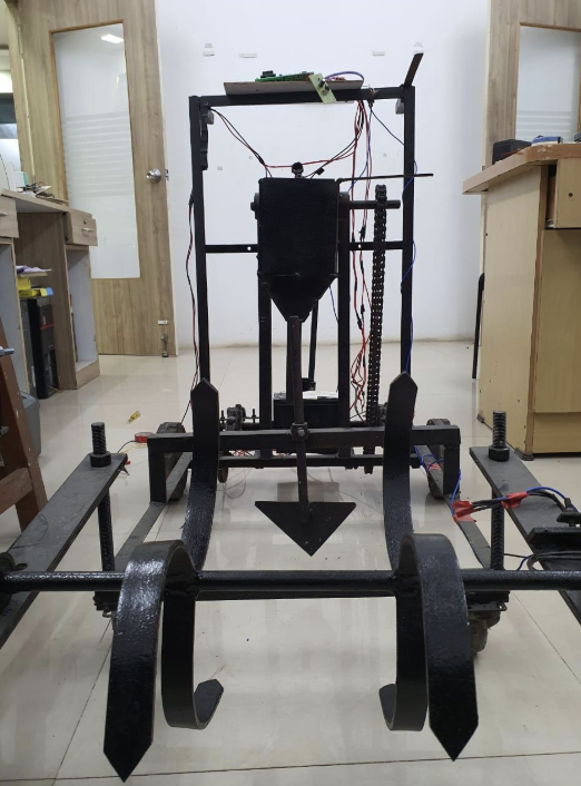 Assembled solar agricultural robot front view with tiller blades